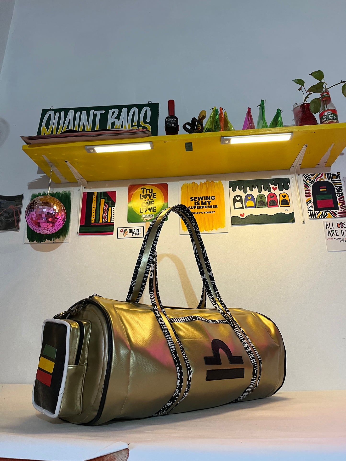 TIME CAPSULE DUFFLE BAG: Gold