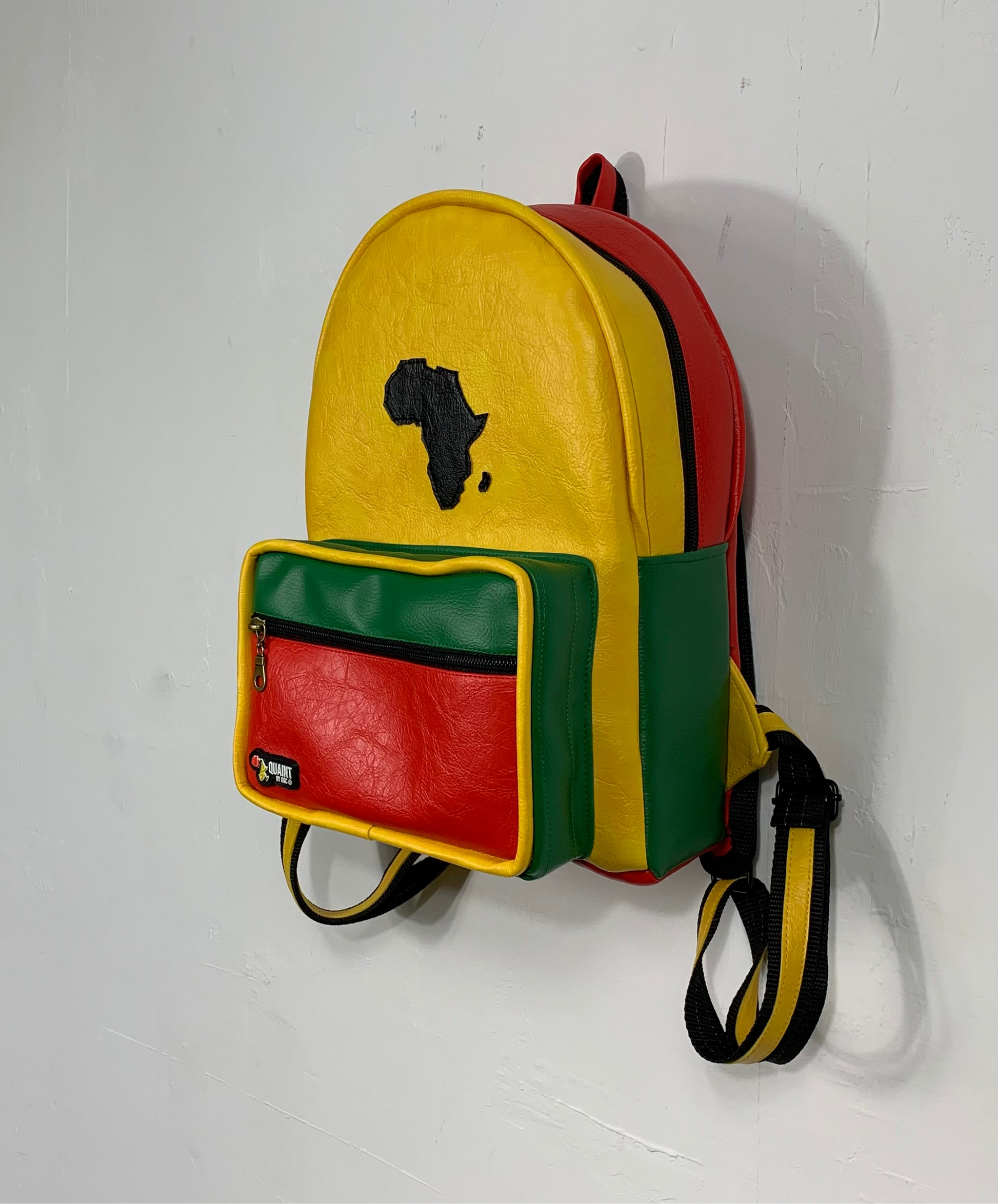 slow fashion clothes, ethical fashion, handmade fashion, backpack, book bag, handmade backpack, reggae backpack, leatherette bag, bag made in jamaica, caribbean products, sew quaint, quaint bags